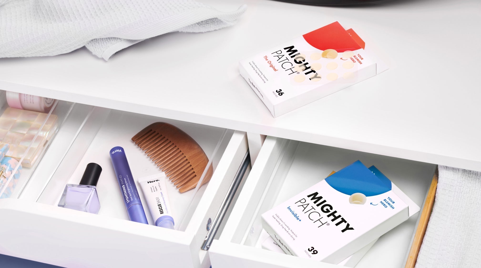 Hero Cosmetics products in two drawers.