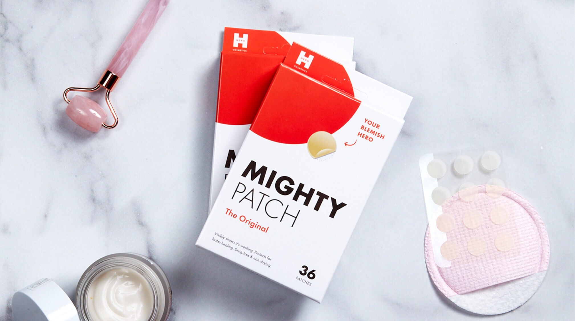 Mighty patch next to skincare products and tools