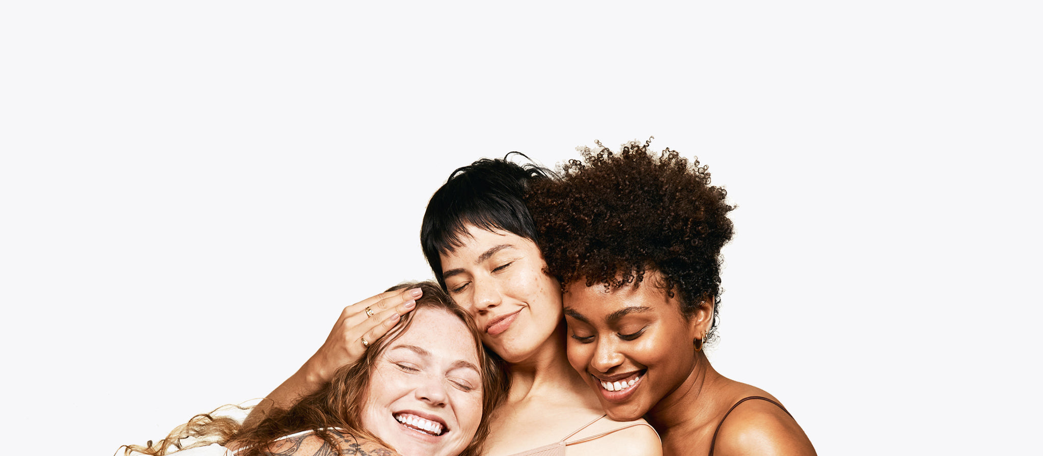 Two hands holding Mighty Patch Original and Micropoint for Blemishes